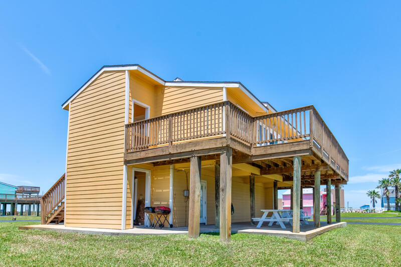 Side of the house with the upper deck