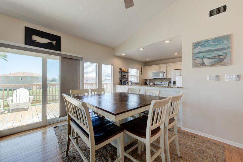Dining table by the sliding doors to the deck