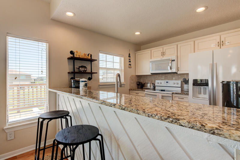 Kitchen breakfast bar with stools