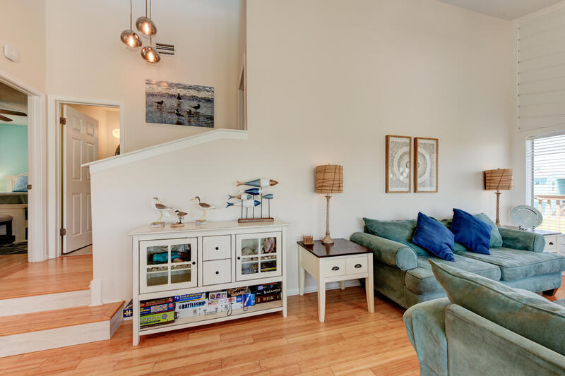 Living room with sideboard and stairs
